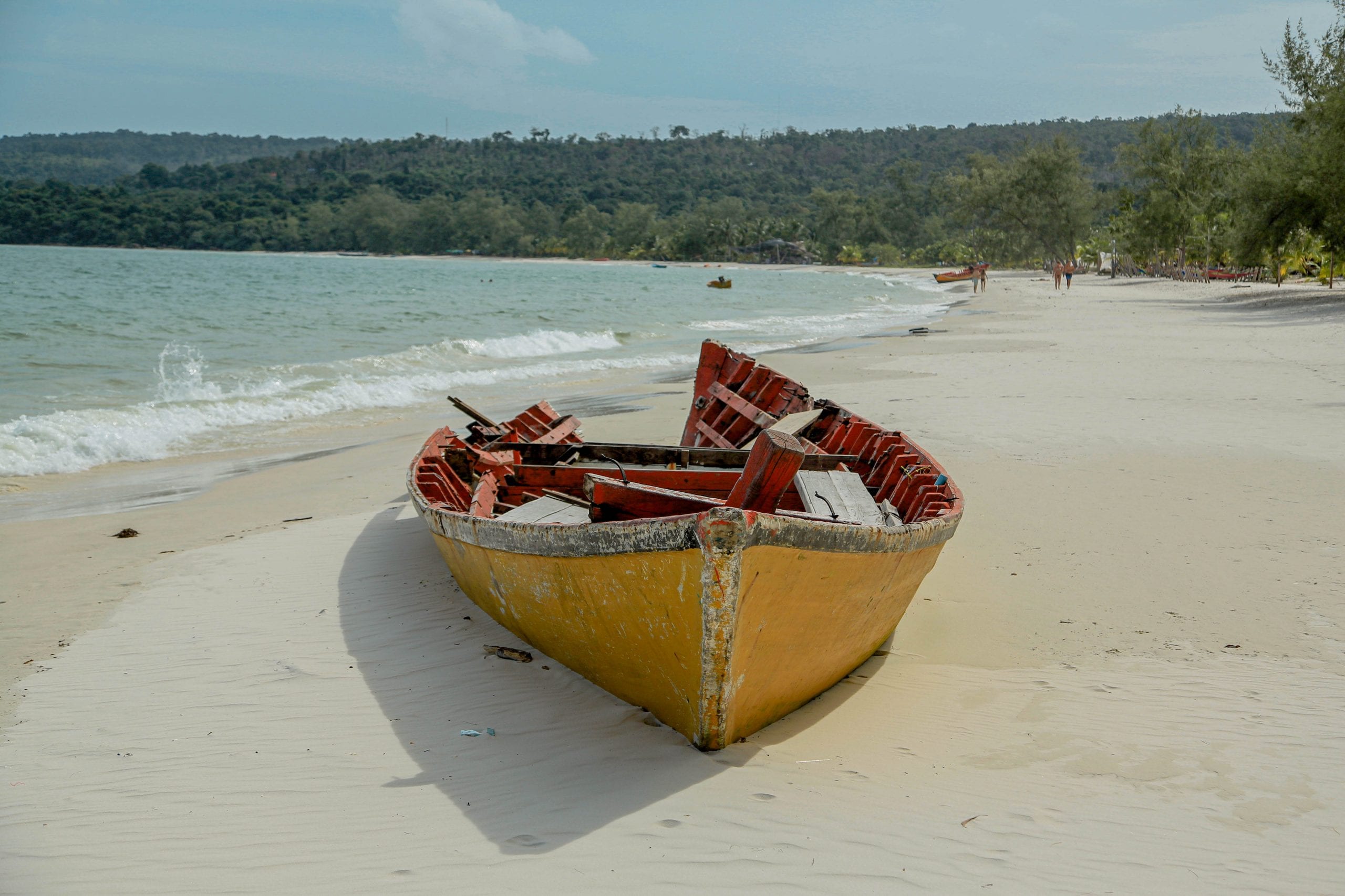 Boat on a empty beach on Koh Rong, Cambodia