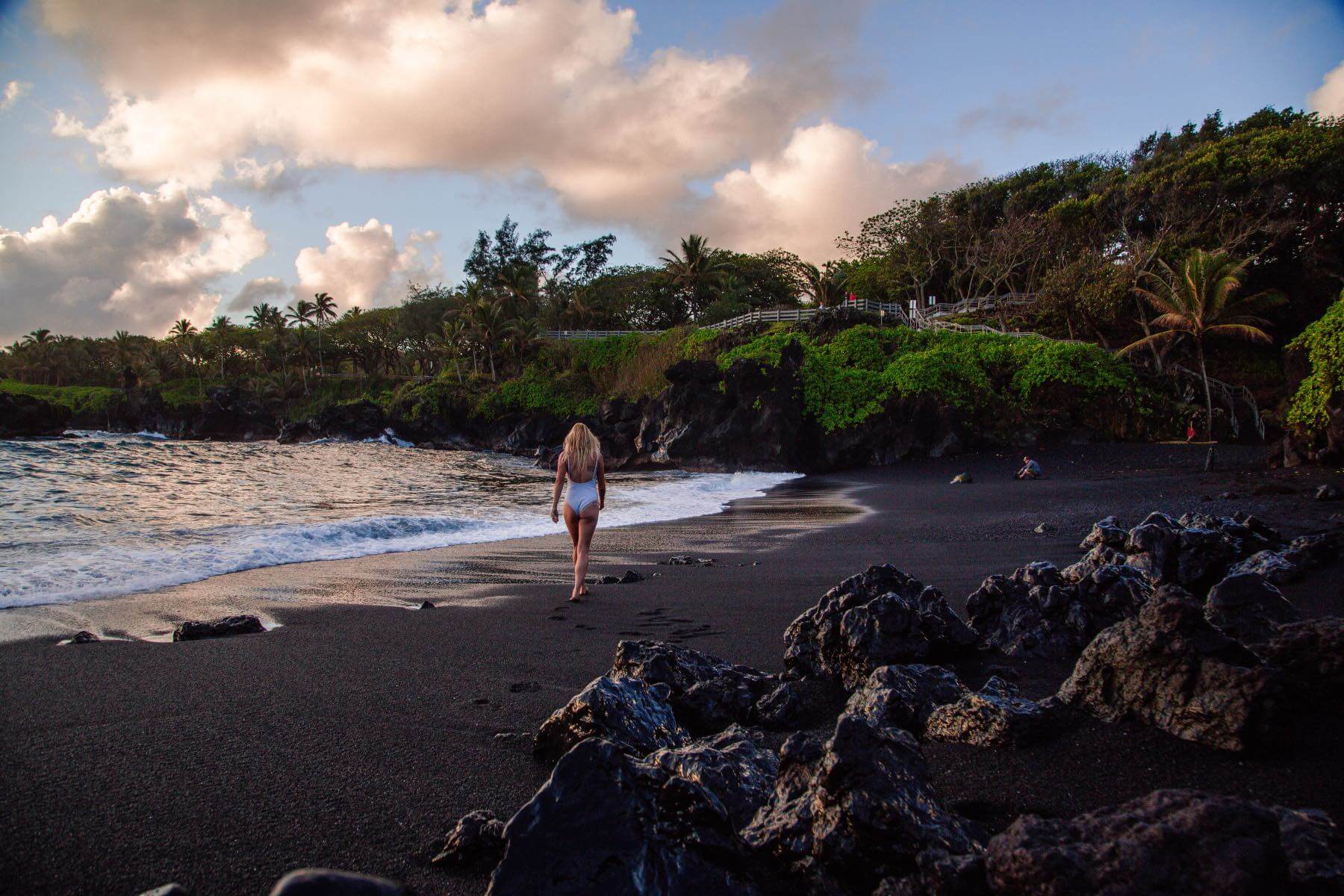 Black Sand Beach Hana HI I'm Jess Traveling on a black sand beach in Maui