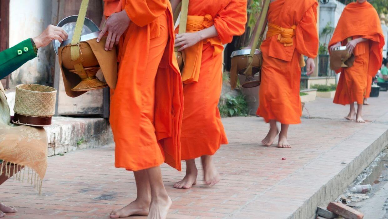 Giving alms to the monks in Laos -2 Giving alms to the monks in Luang Prabang, Laos
