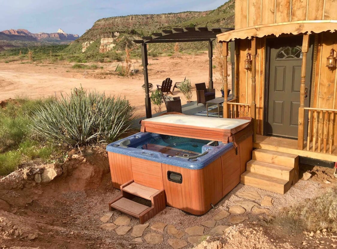 Outside of the Ark with views of the red rock and a hot tub