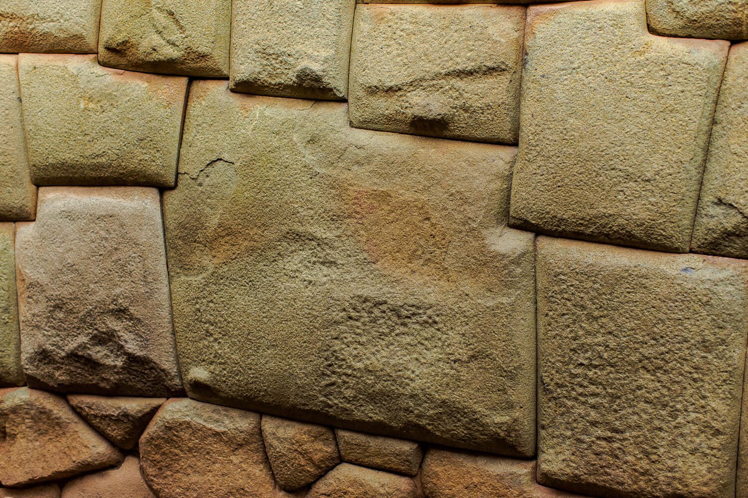 Admiring the 12 angle stone in Cusco, Peru The twelve angle stone in Cusco