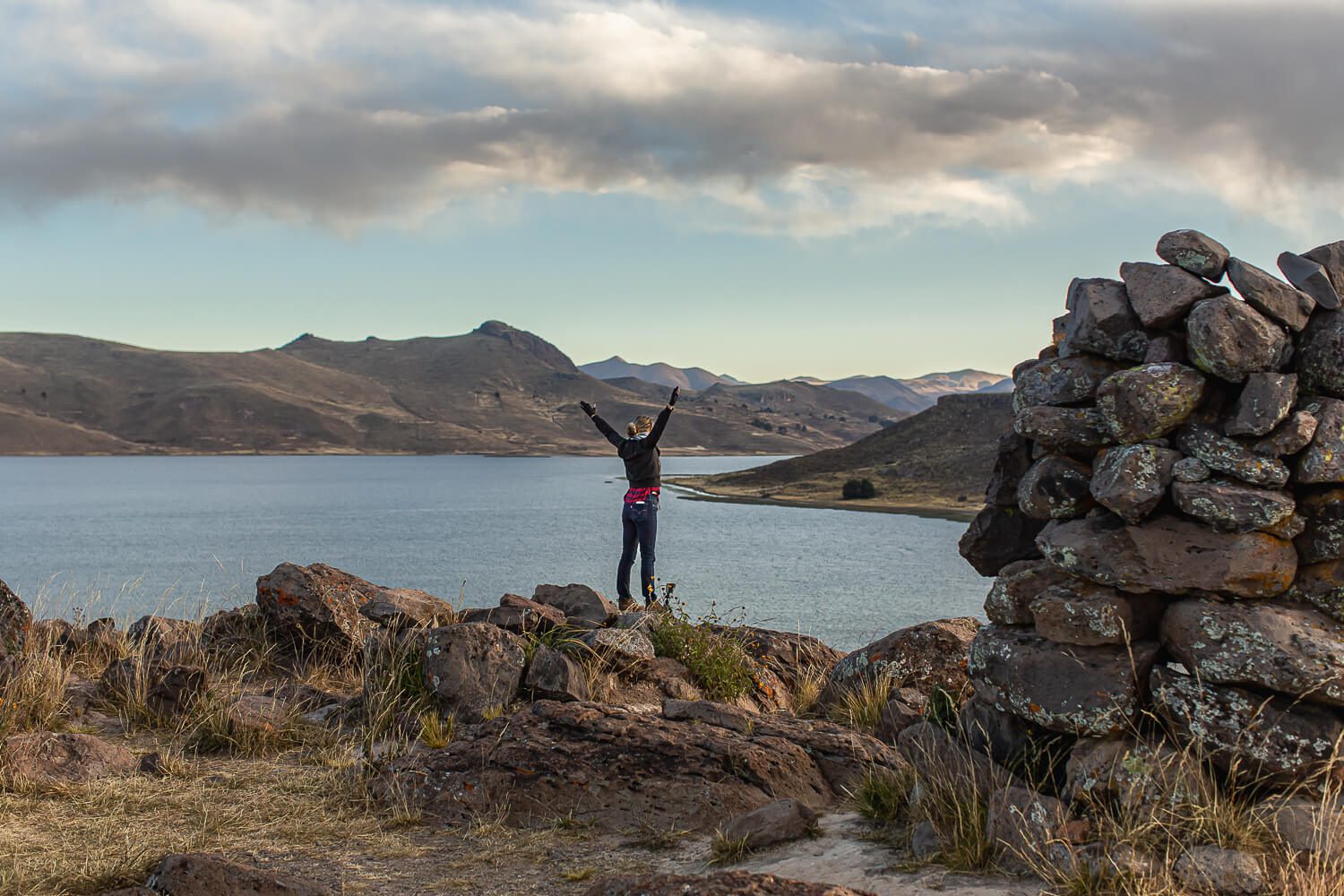 I'm Jess Traveling with an epic view in Puno Peru Sunset at Sillustani Peru