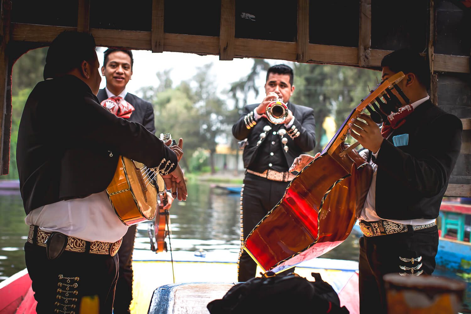 Mariachi bands singing I'm Jess Traveling Happy Birthday Mariachi bands on Mexico City's floating canals