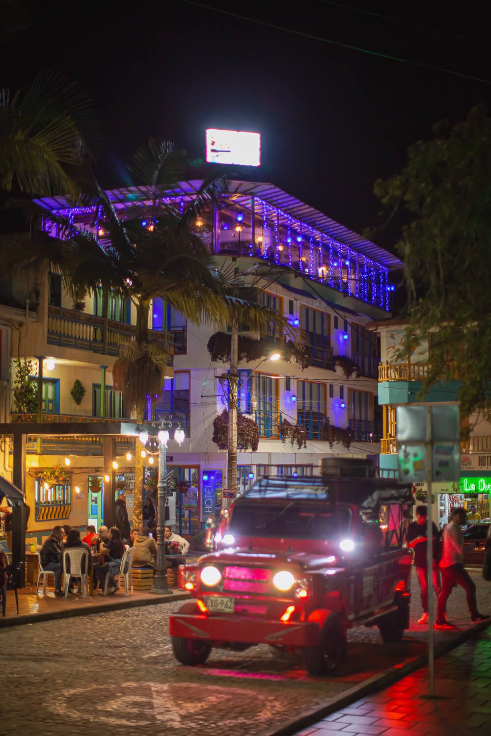 Tuk Tuk in the night in Guatape Town Lit up tuk tuk in Guatape Colombia