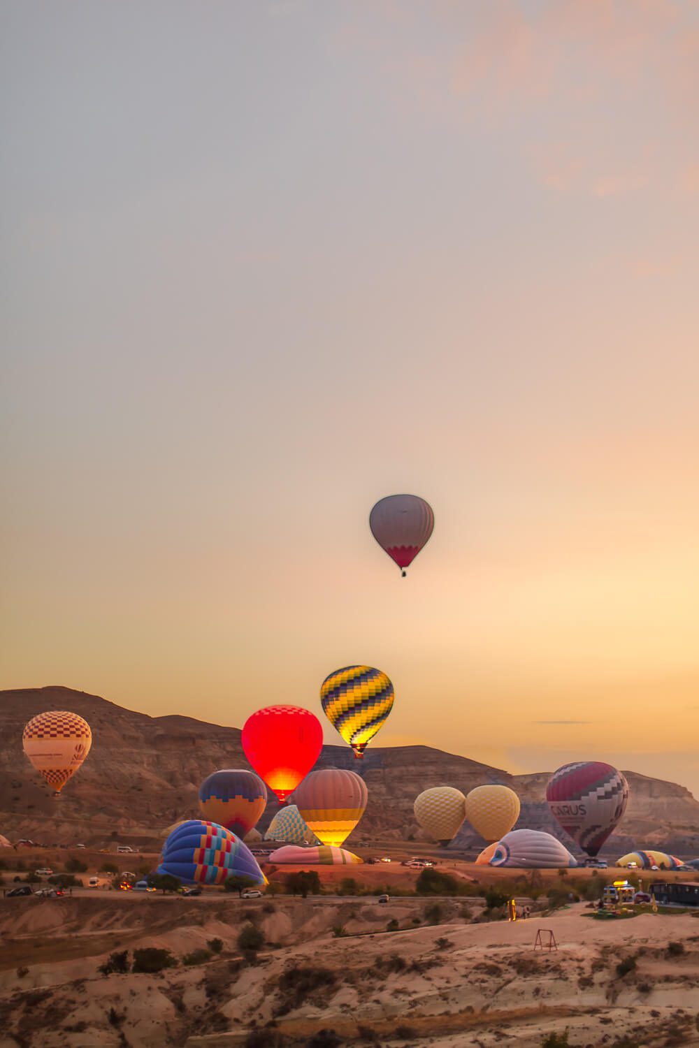 Cappadocia balloon ride at sunrise Hot air balloons at sunrise in Cappadocia