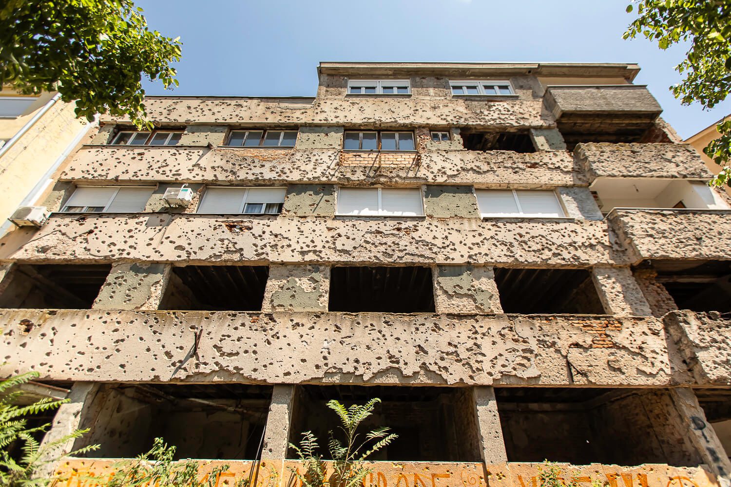 Building with bullet holes in Bosnia 
